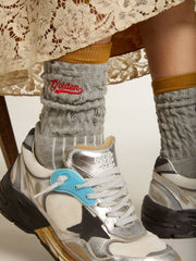 Gray ribbed socks with orange details and red logo