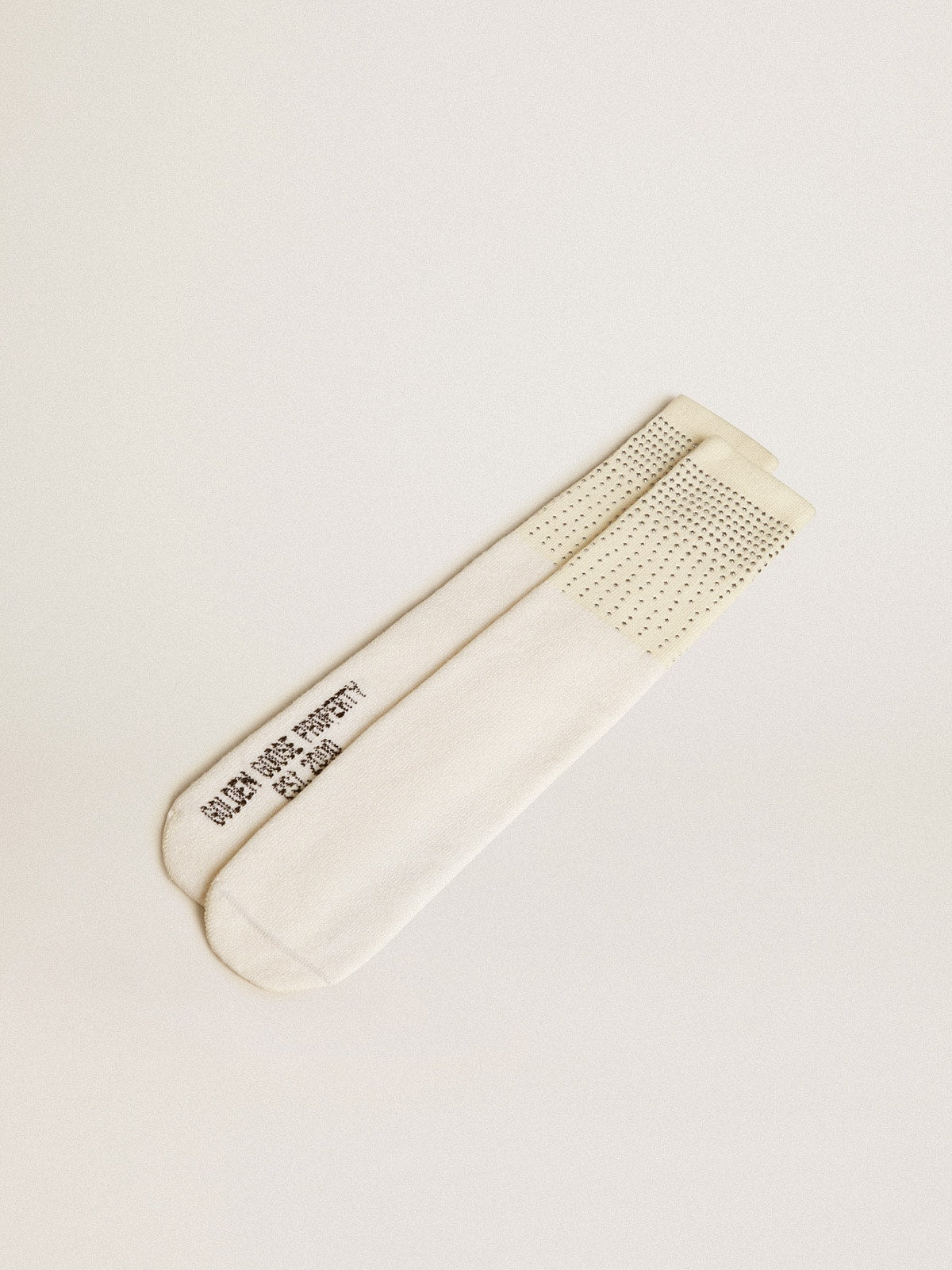 Worn-white socks with applied crystals