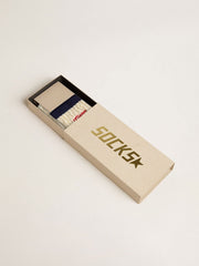 Cream ribbed socks with navy blue details and red logo