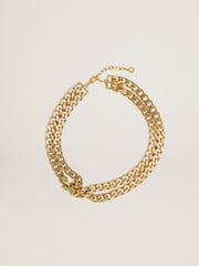 Antique gold-colored braided chain necklace with star-shaped clasp