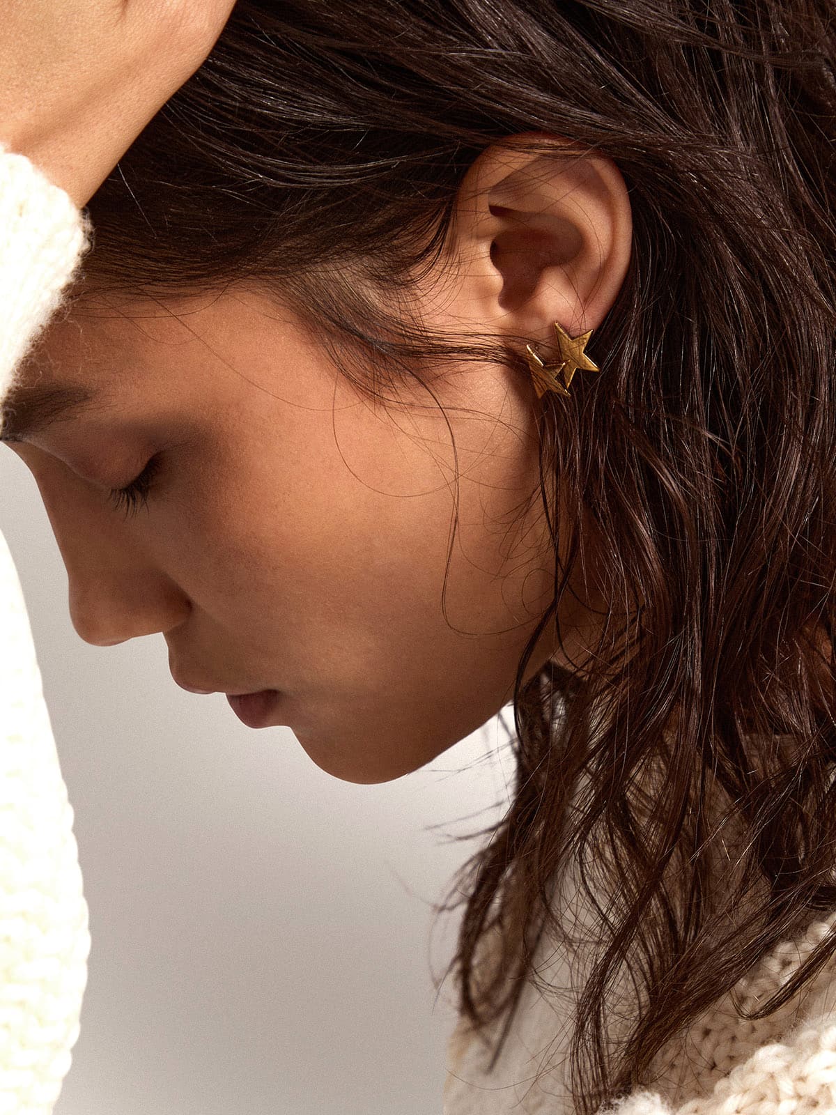 Women's stud earrings in antique gold color