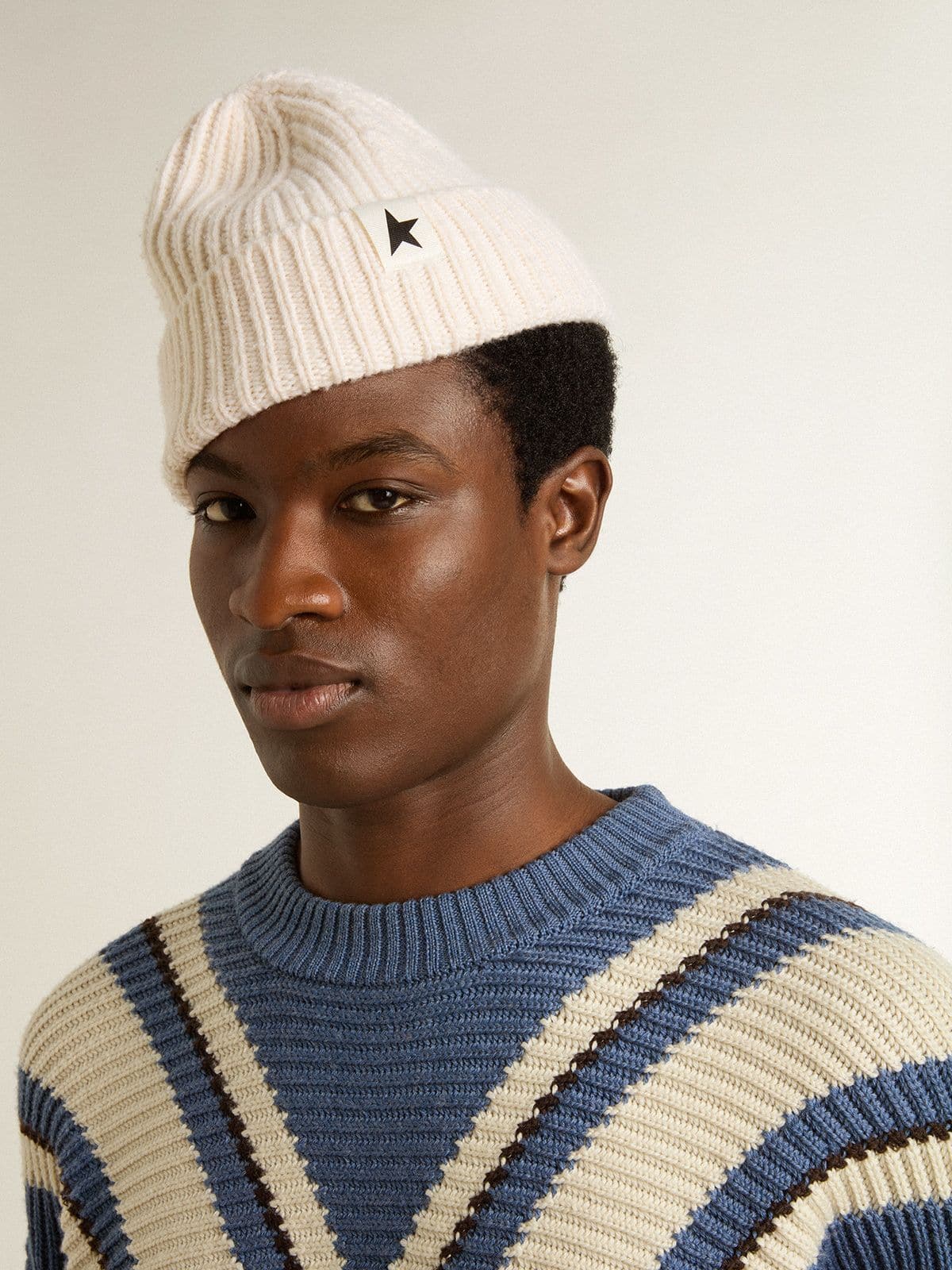 White wool beanie with black star