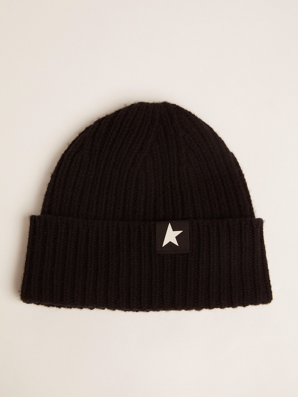 Black wool beanie with white star