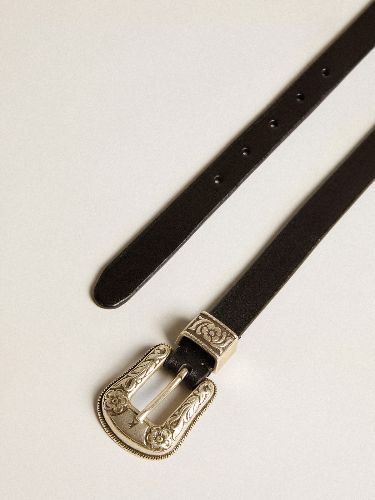 Black belt in washed leather with silver color buckle