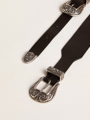 Black belt in washed leather with silver-colored double buckle