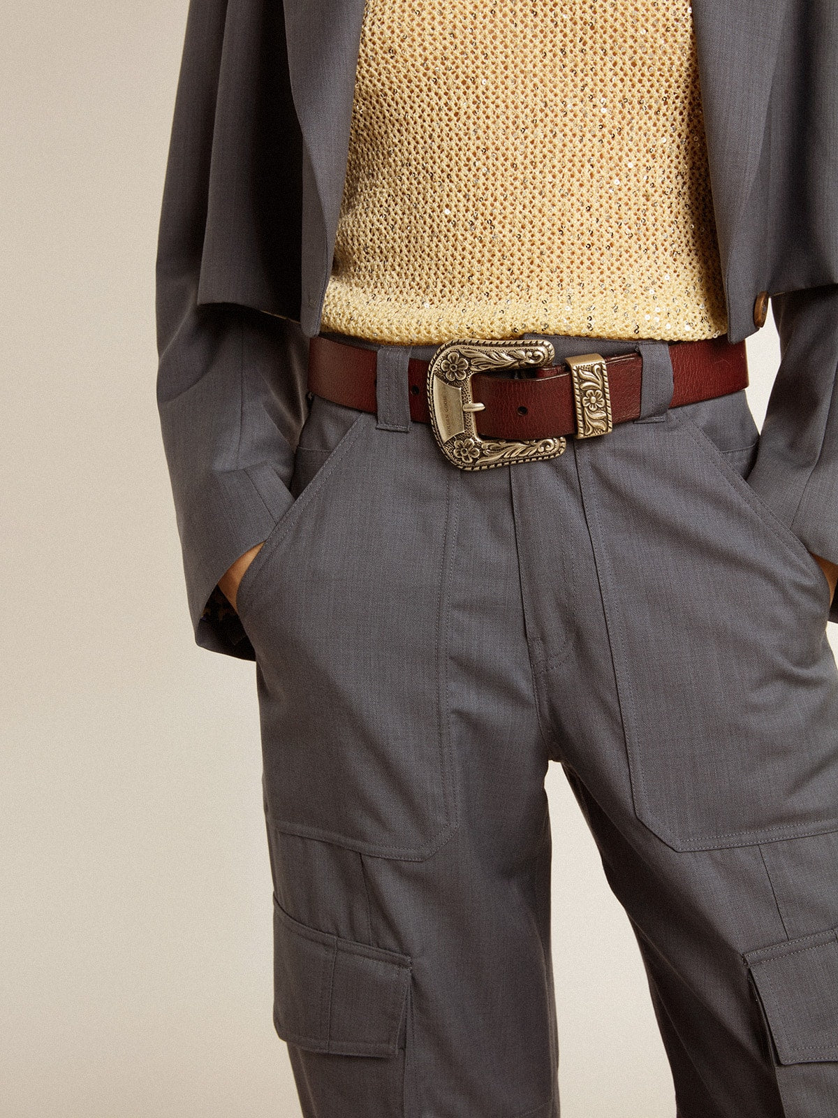 Women’s belt in burgundy leather with decorated silver buckle