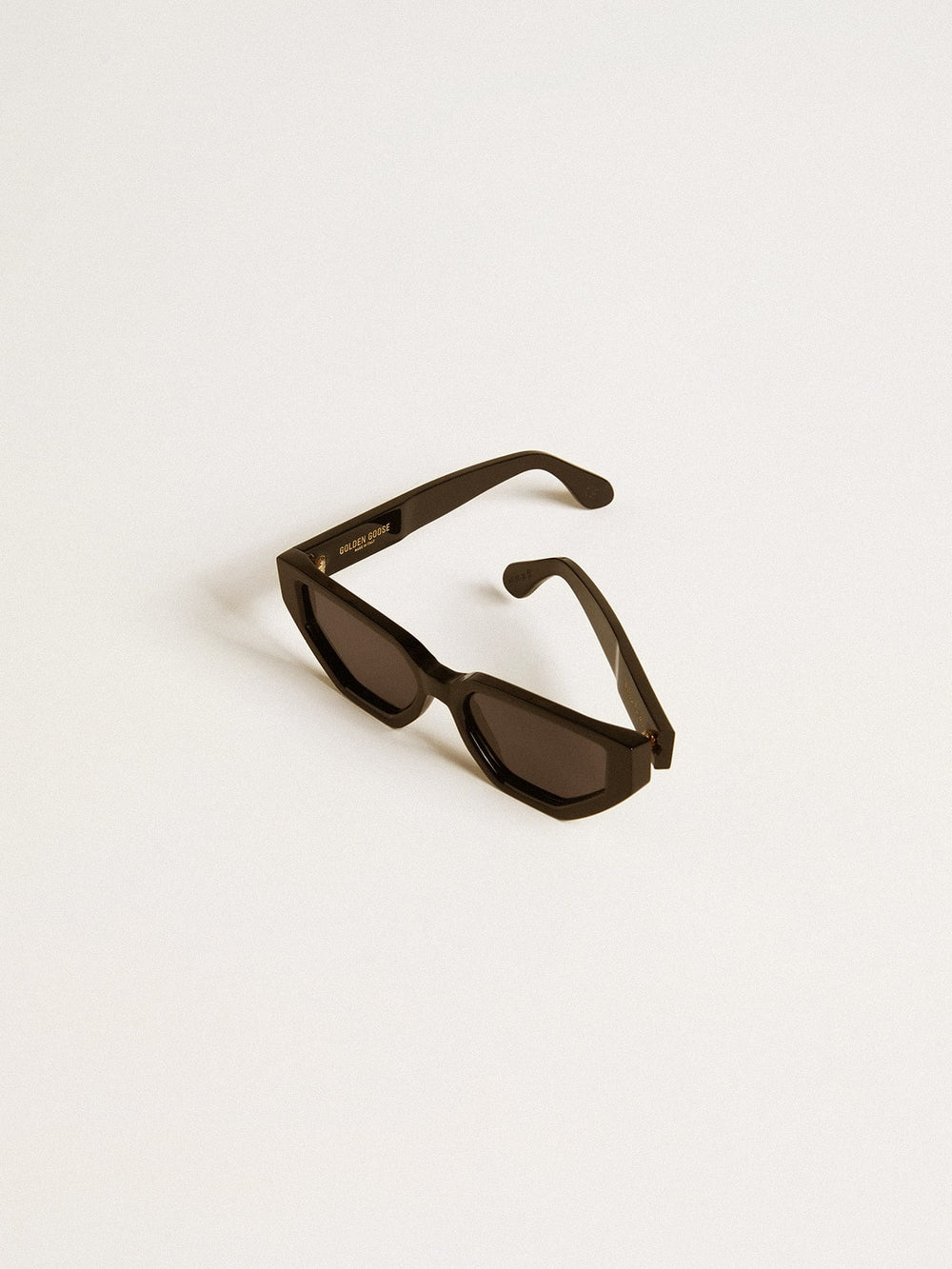 Rectangular style sunglasses with black frame and lenses