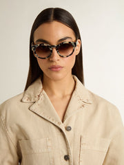 Cameron-style sunglasses with a tortoiseshell pattern