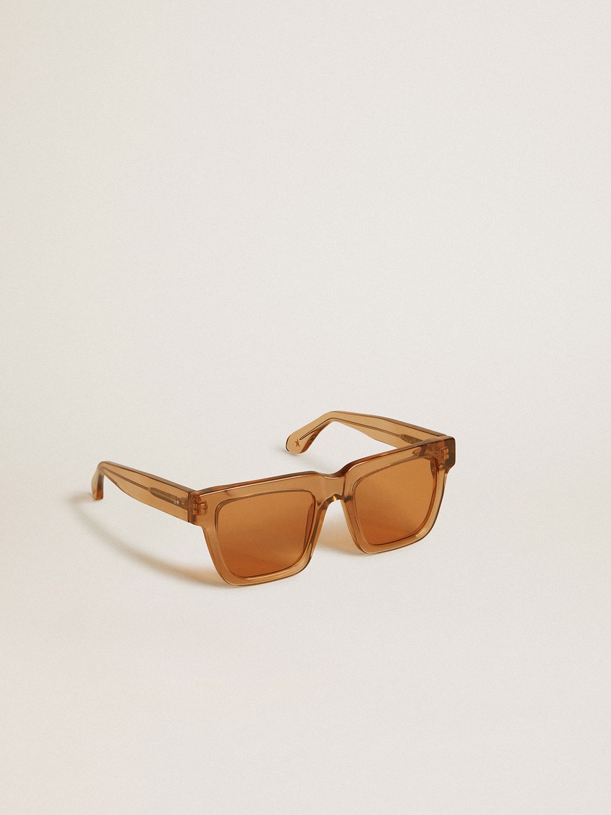 Jamie style square sunglasses with honey-colored frame and lenses