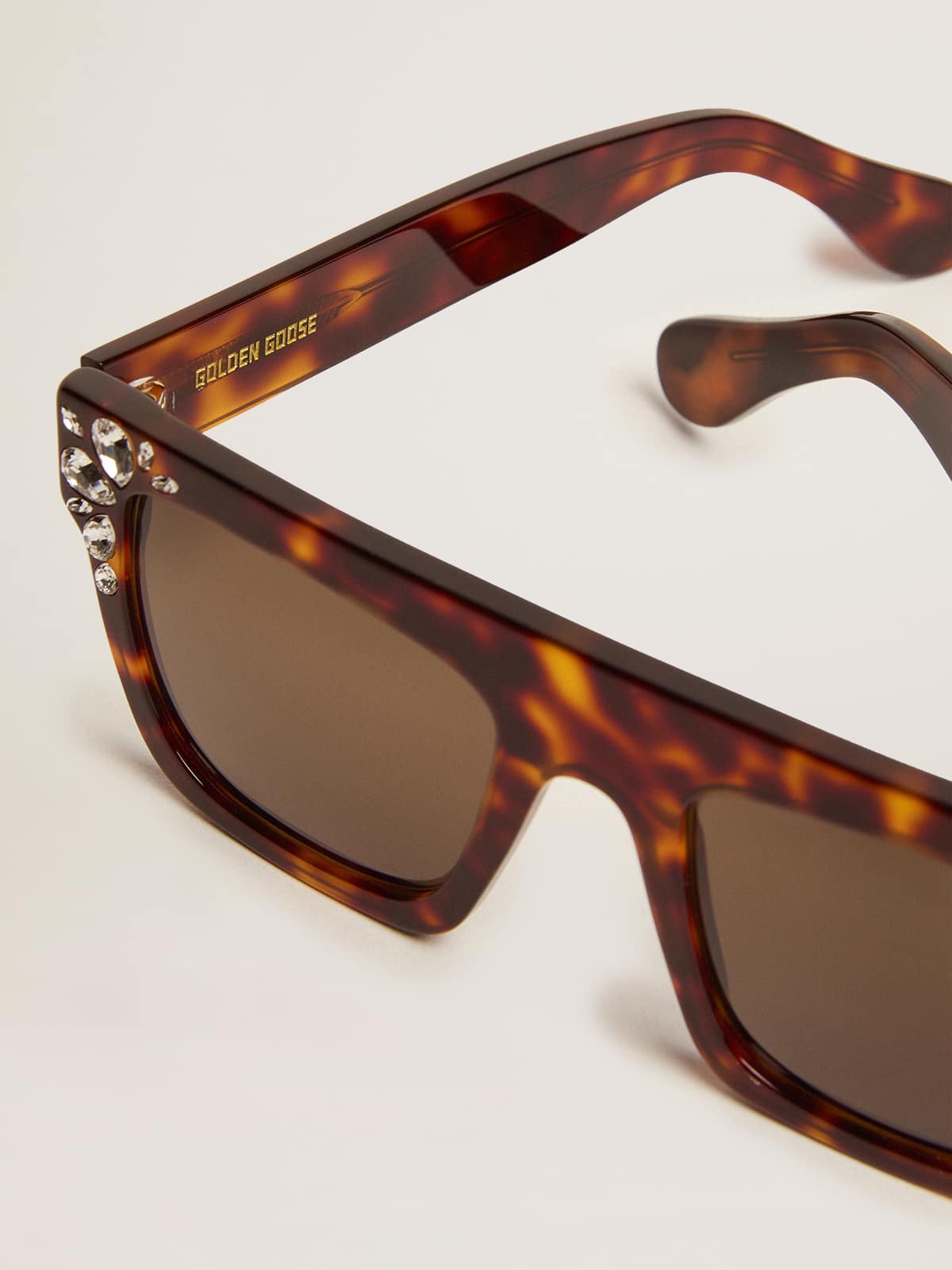 Square model sunglasses with havana frame and crystals