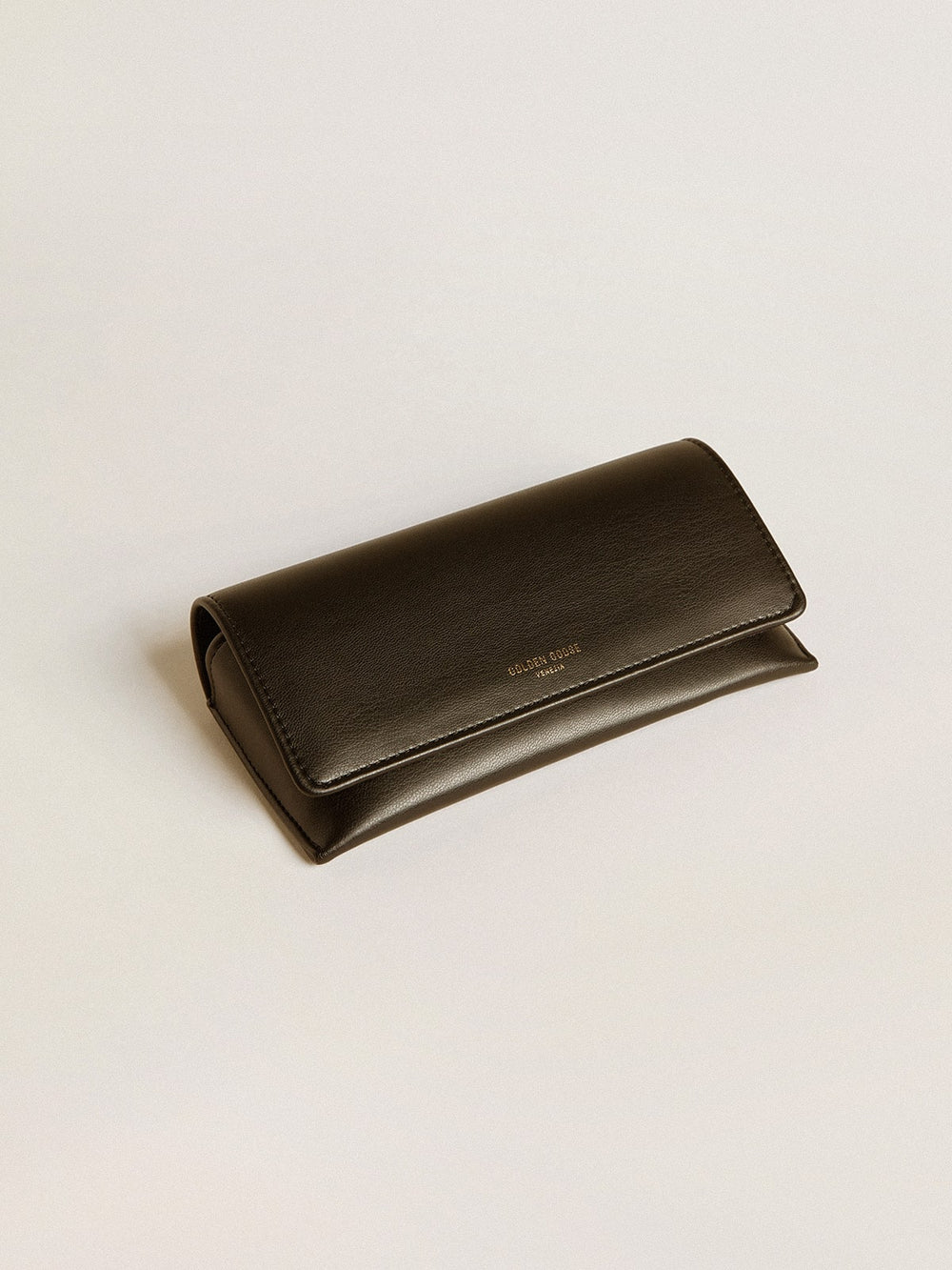 Aviator style sunglasses with black frame and lenses