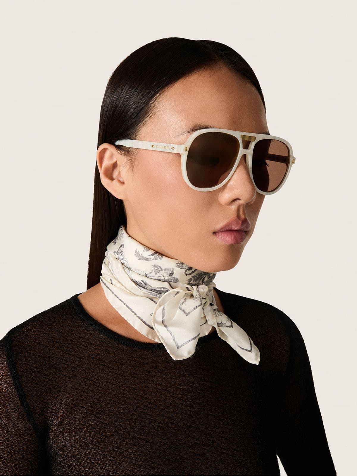 Charlie aviator sunglasses with pearl white frame and gold lenses