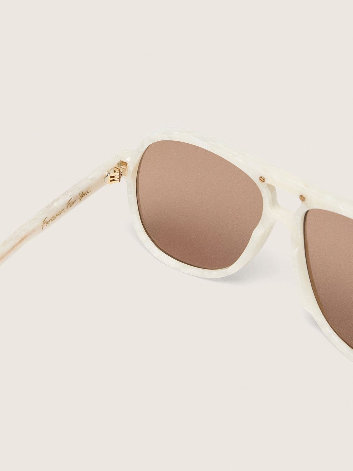 Charlie aviator sunglasses with pearl white frame and gold lenses