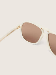 Charlie aviator sunglasses with pearl white frame and gold lenses