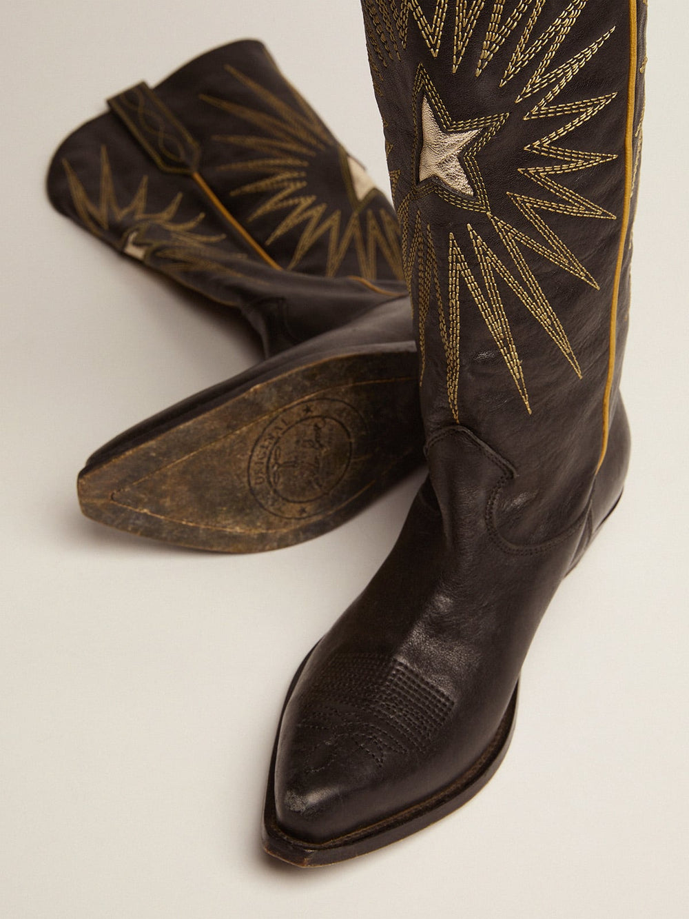 Wish Star boots in black leather with platinum laminated leather inlay star