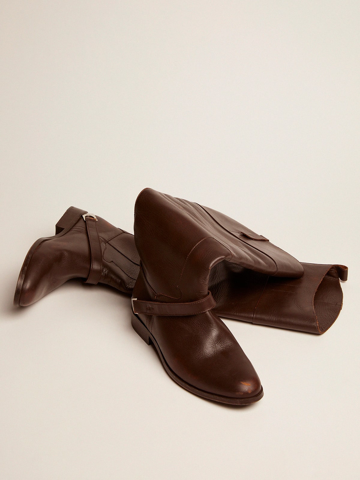 Women's Charlie boots in dark brown leather and clamp on the heel