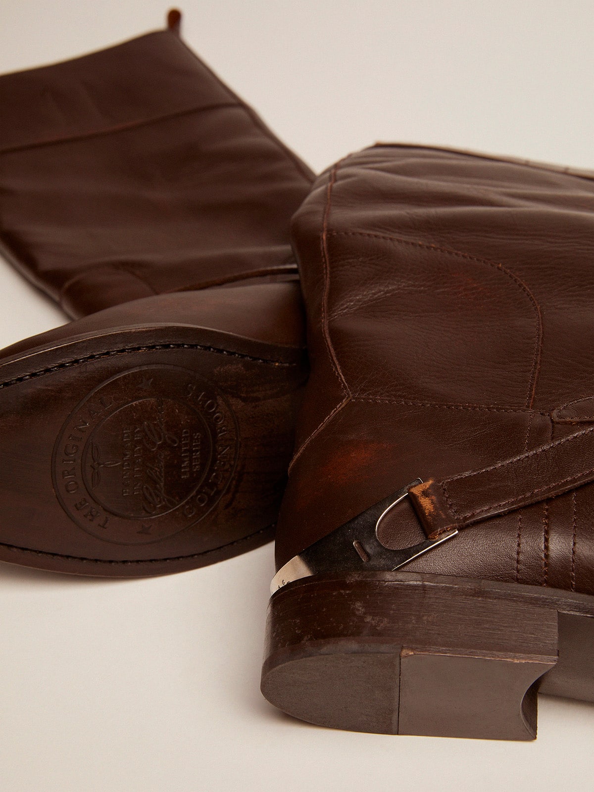 Women's Charlie boots in dark brown leather and clamp on the heel