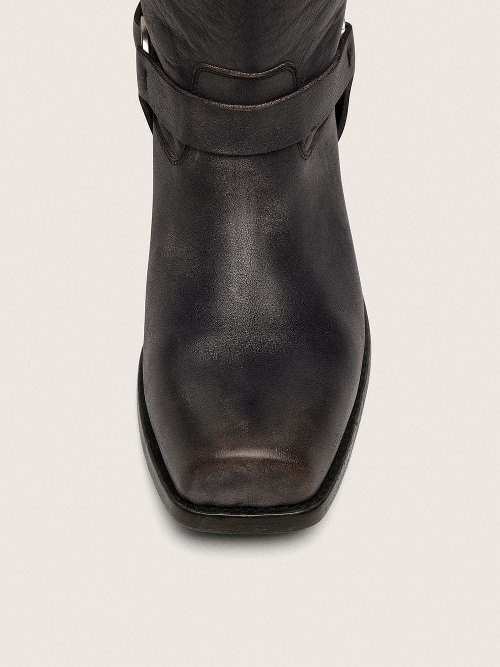 Women's high Biker boots in black leather with strap and silver-colored buckle