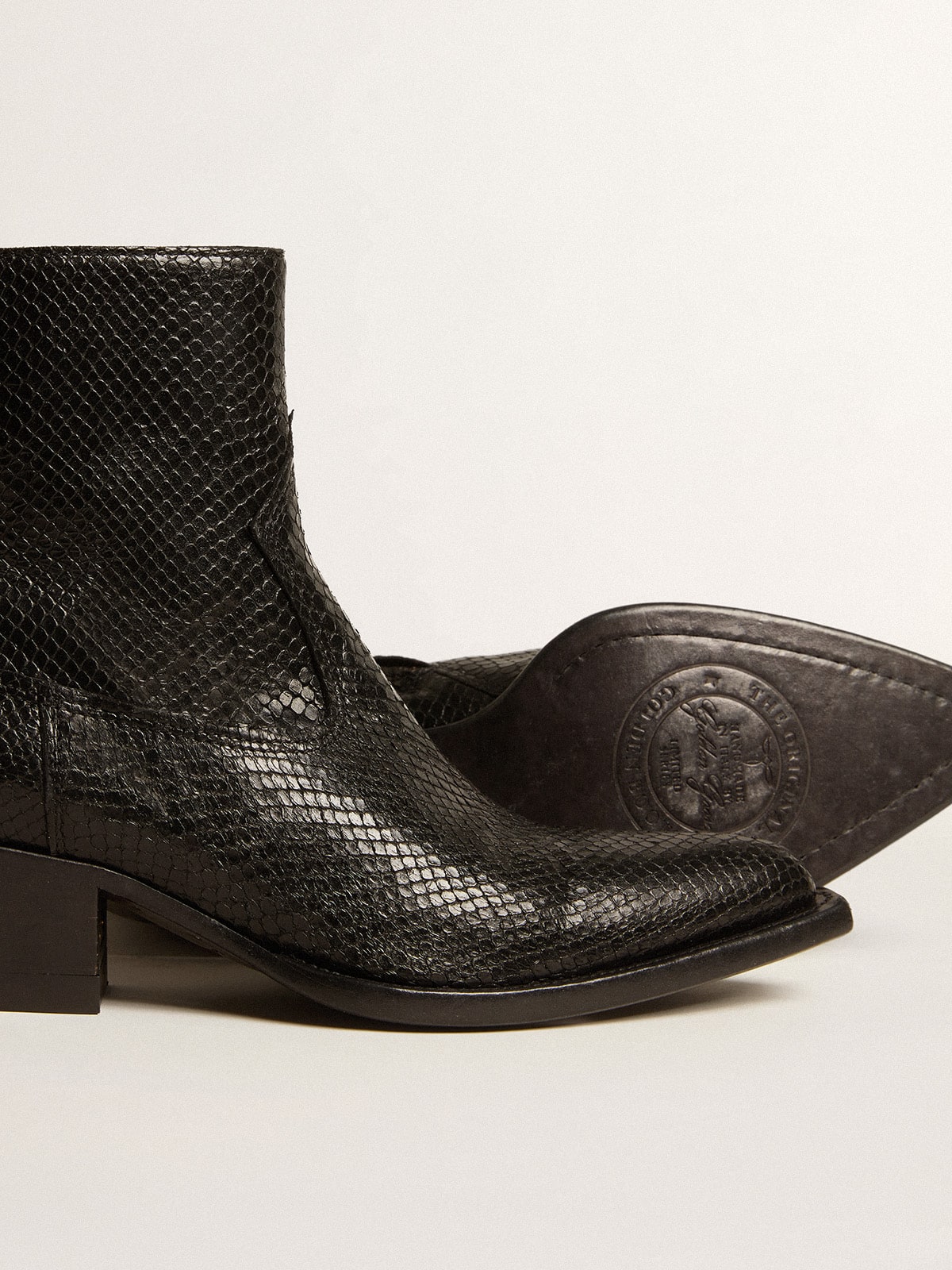 Low Debbie boots in black snake-print leather
