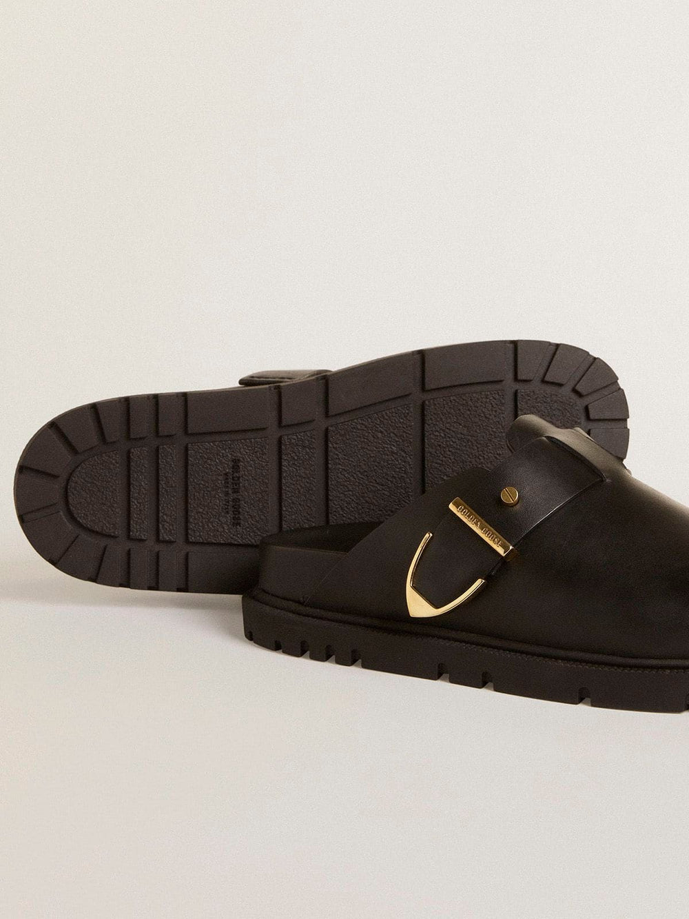 Women's Lucy Sabot in glossy black leather with gold metal buckle