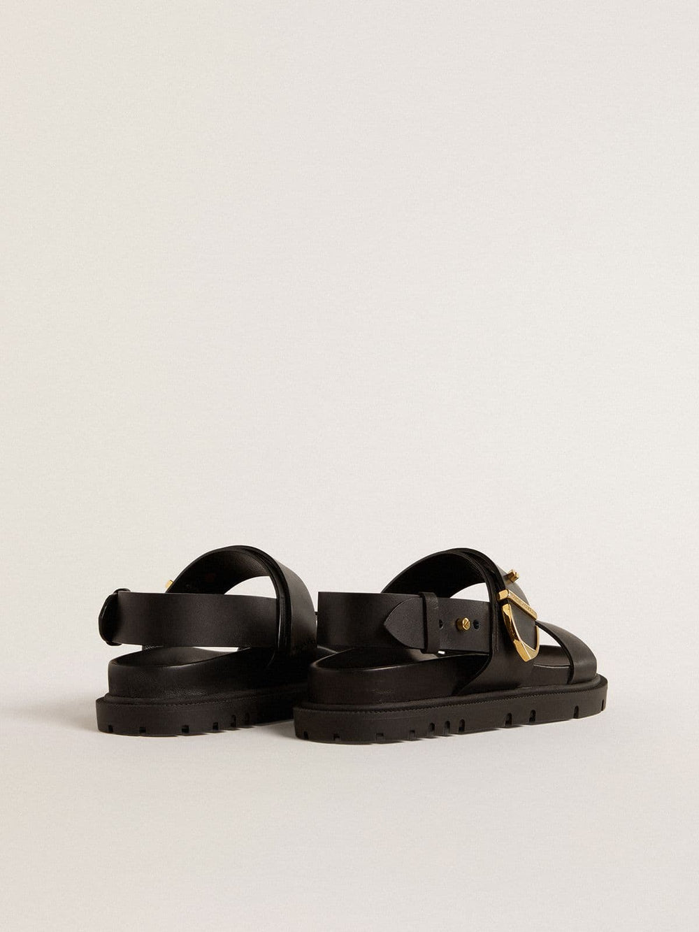 Women's Lucy sandal in glossy black leather with gold metal buckle