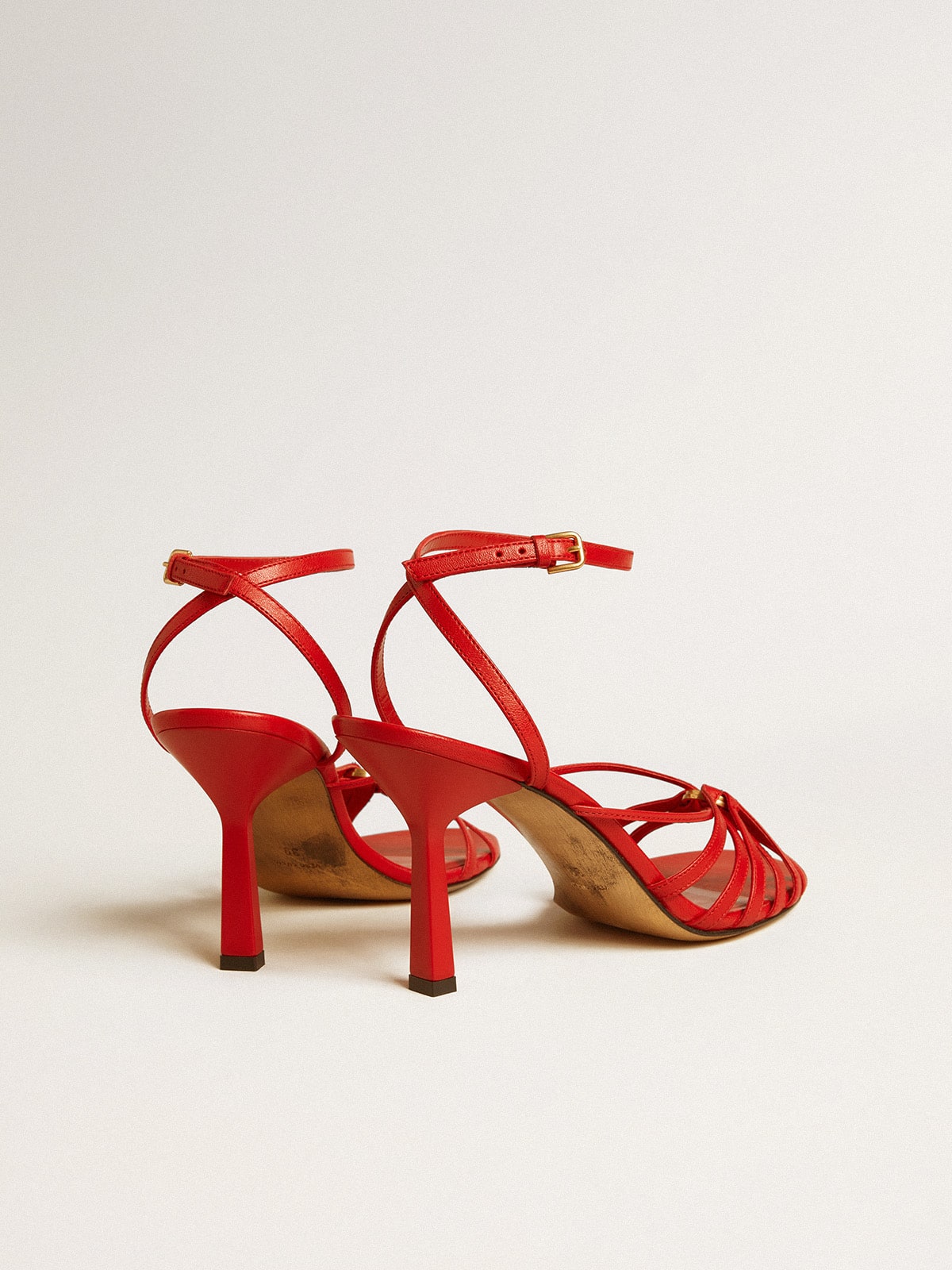 Nico high heel sandals in red nappa leather with gold chain