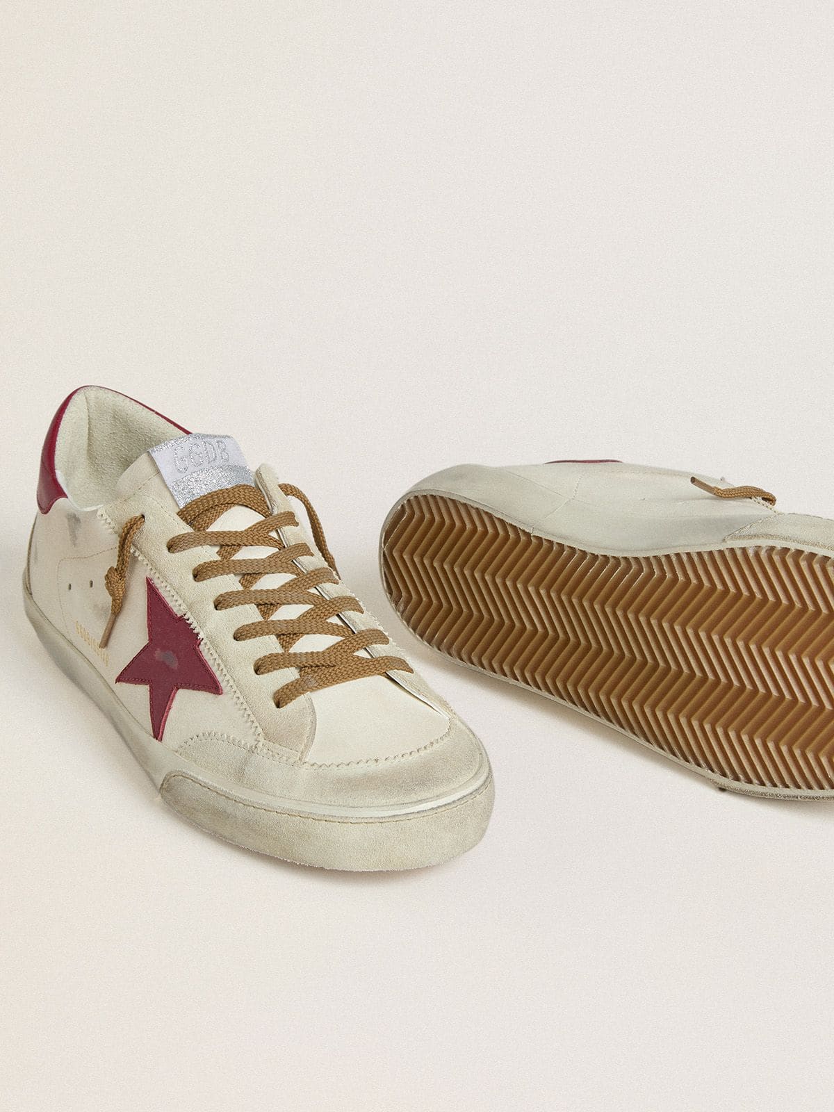 Men's Super-Star with red leather star and beige suede inserts