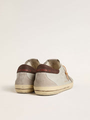 Men's Super-Star with tobacco-colored croc-print leather star and black leather heel tab