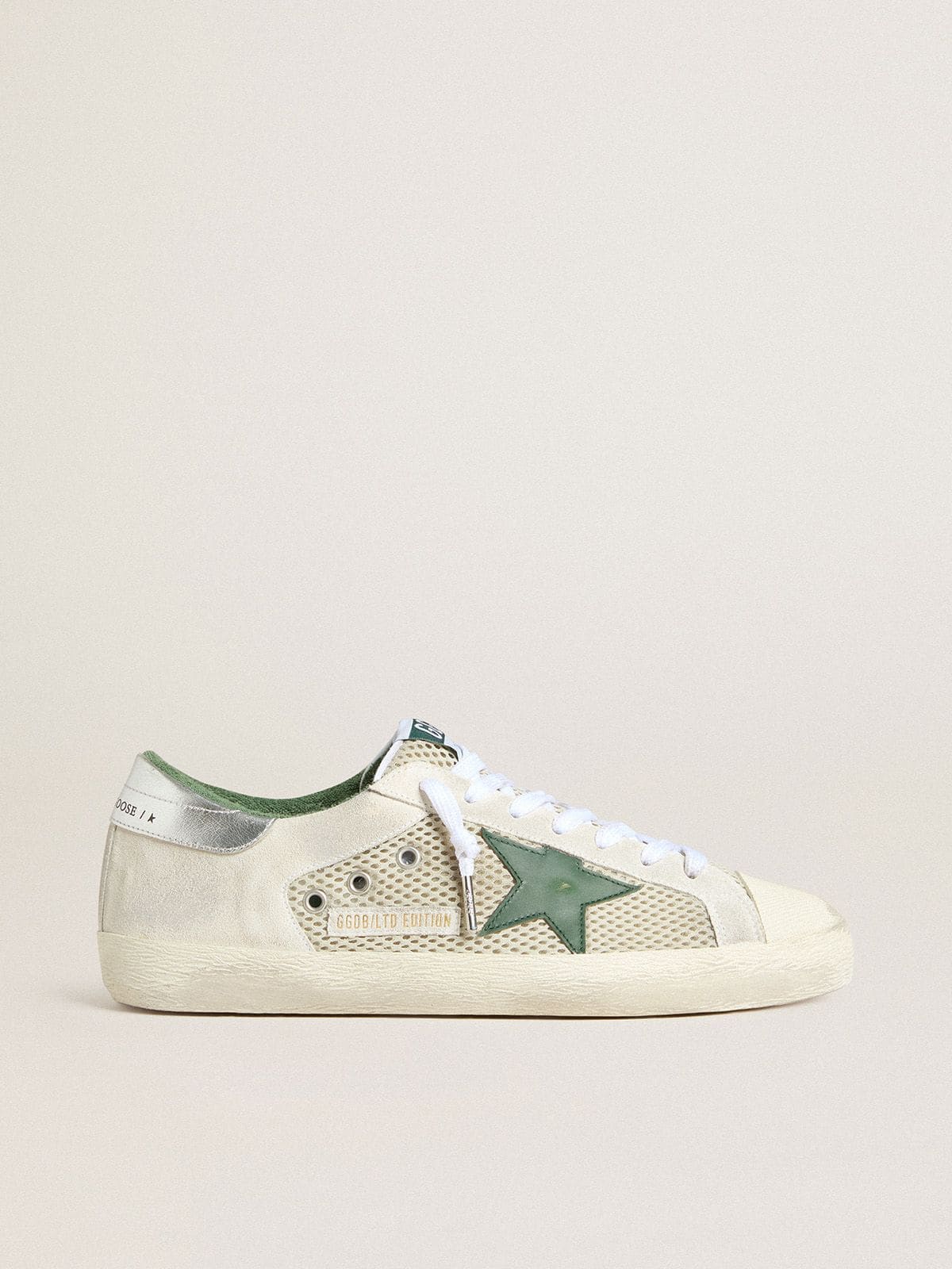 Men’s Super-Star LTD in white suede and mesh with green leather star and silver heel tab