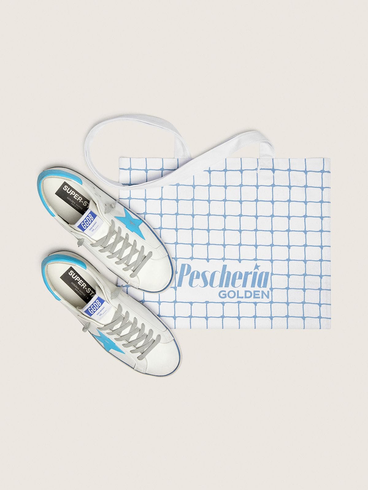 Men's Super-Star LTD in white leather with light blue leather star and heel tab