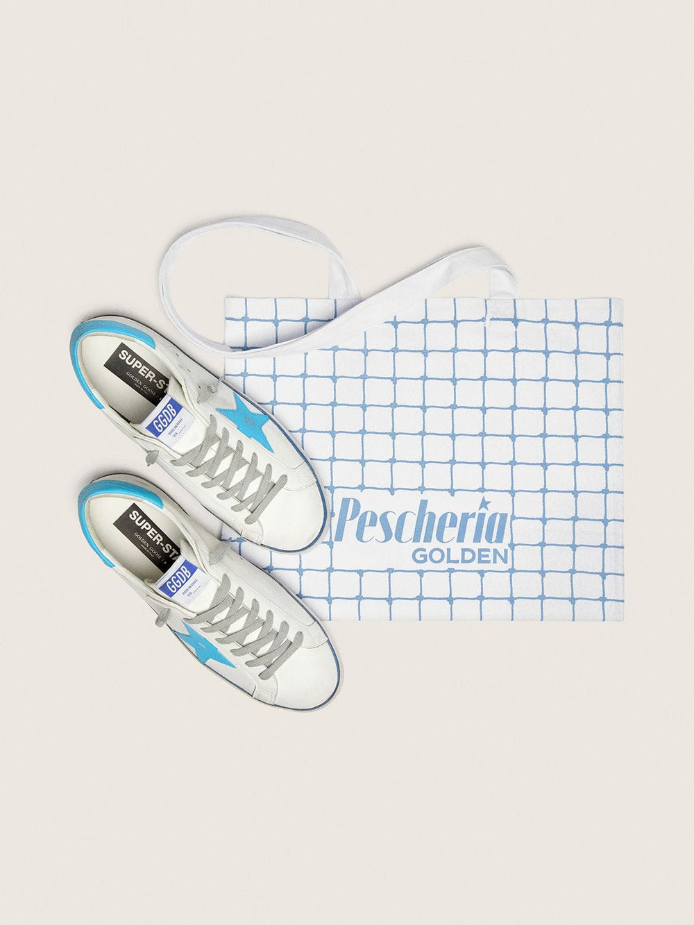 Men's Super-Star LTD in white leather with light blue leather star and heel tab