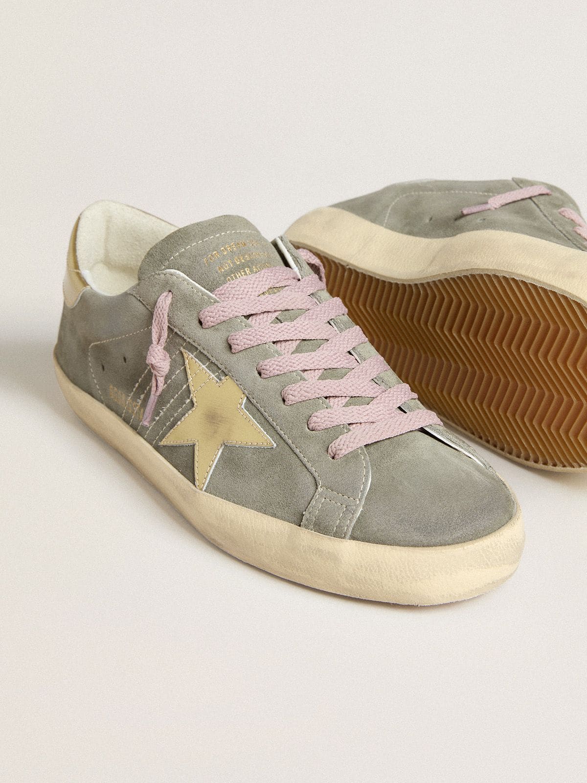 Men's Super-Star in gray suede with gold metallic leather star and heel tab