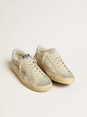 Men's Super-Star in white leather with all-over lettering and ice-gray suede star