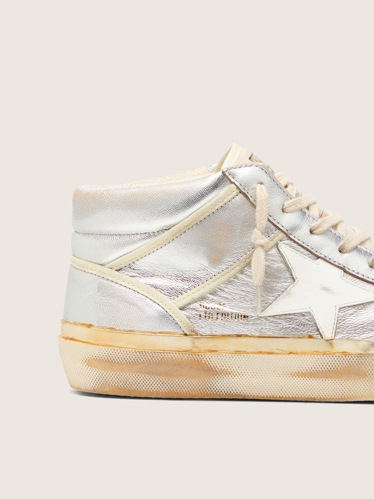 Men’s Mid Star in silver metallic leather with ivory star