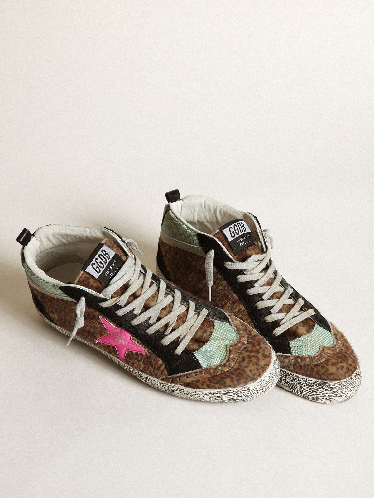 Mid Star in leopard-print pony skin with fuchsia leather star