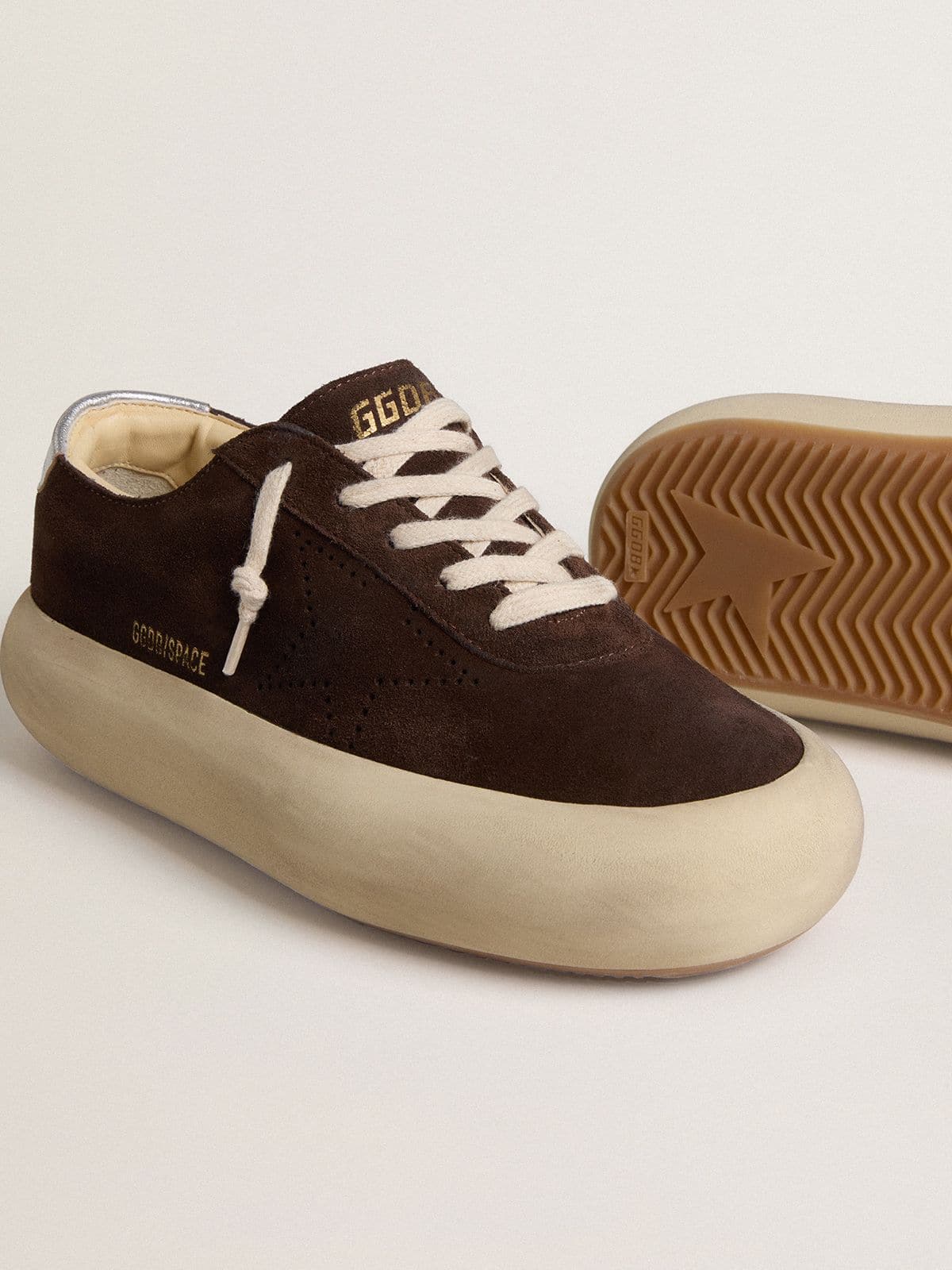 Men's Space-Star in dark brown suede with metallic silver heel tab