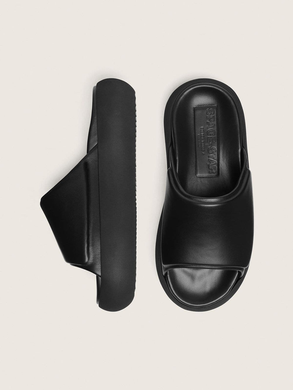 Men's Space-Star slip-ons in black leather