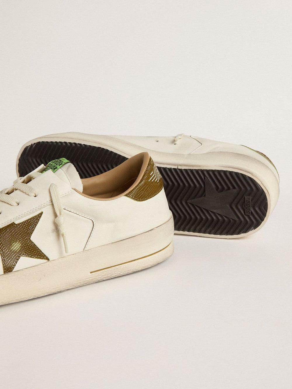 Men's Stardan in white leather with military-green snake-print leather star and heel tab