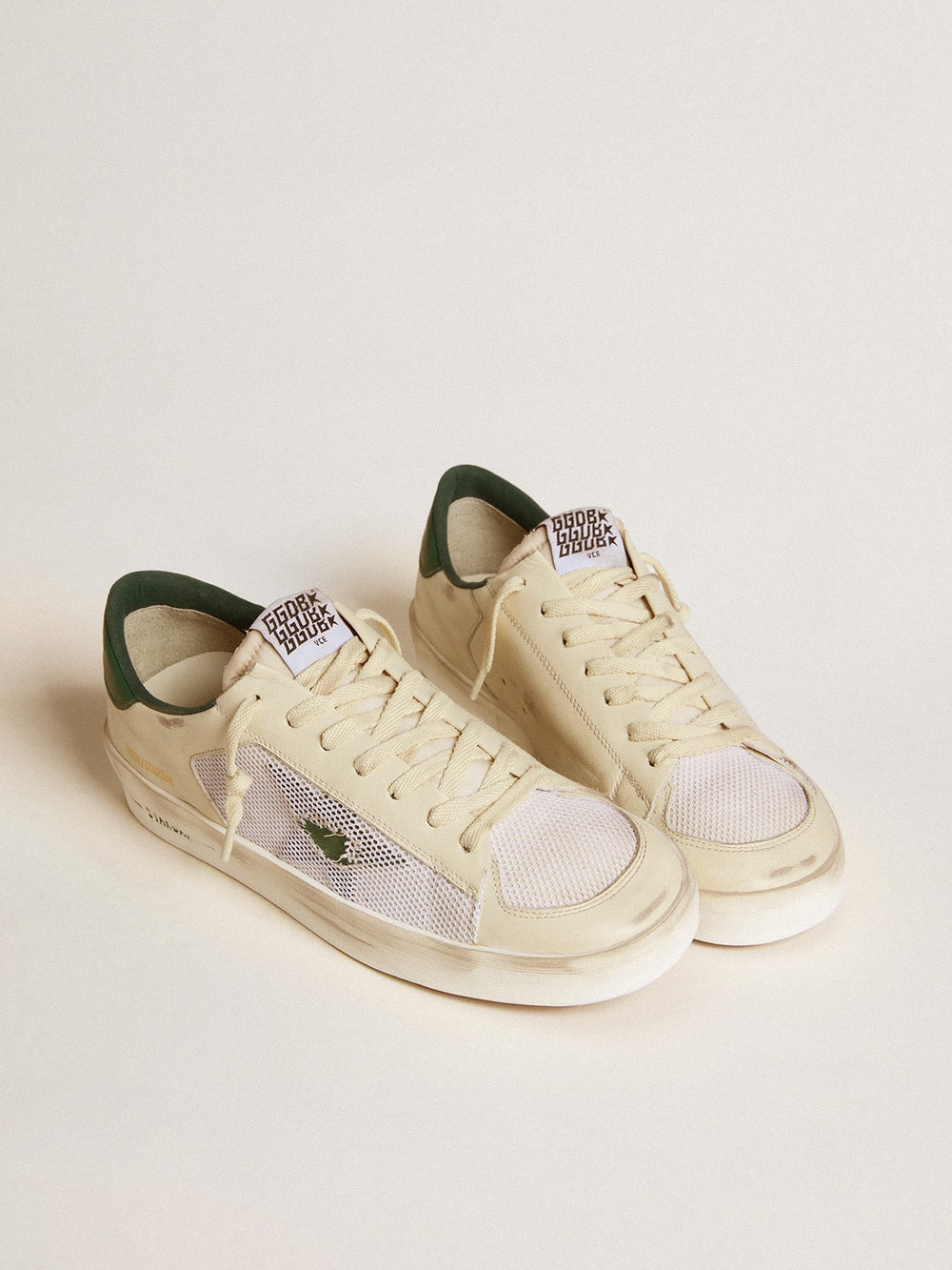 Stardan in white suede and mesh with green leather star and heel tab