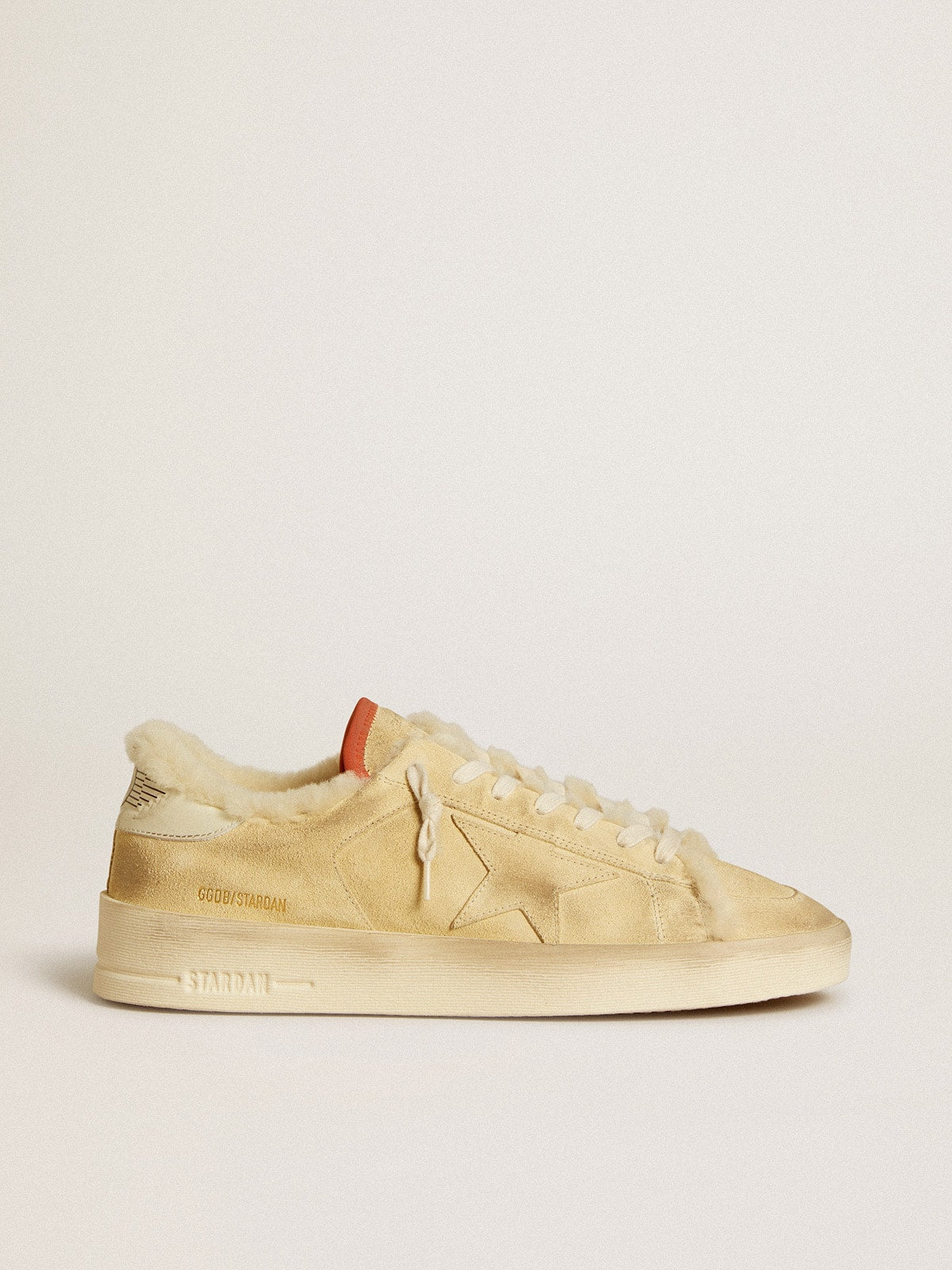 Stardan in beige suede with leather heel tab and shearling lining