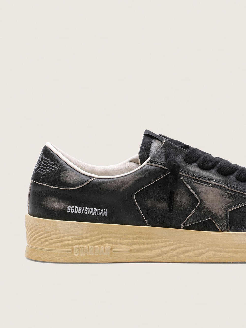 Men's Stardan in black leather with black leather star and heel tab