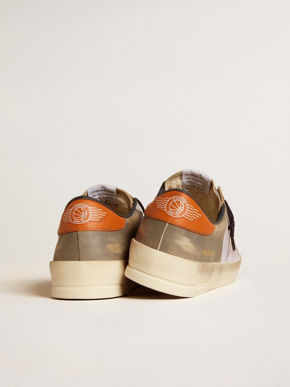 Stardan LTD in gray leather and mesh with leather star and heel tab