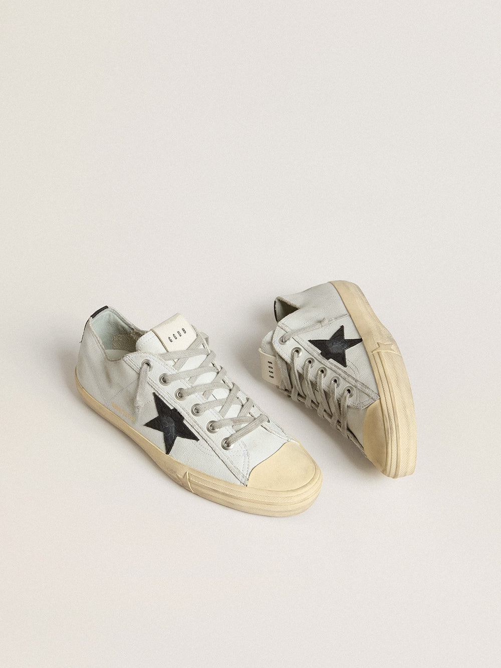V-Star in leather with black crocodile-print leather star and heel tab