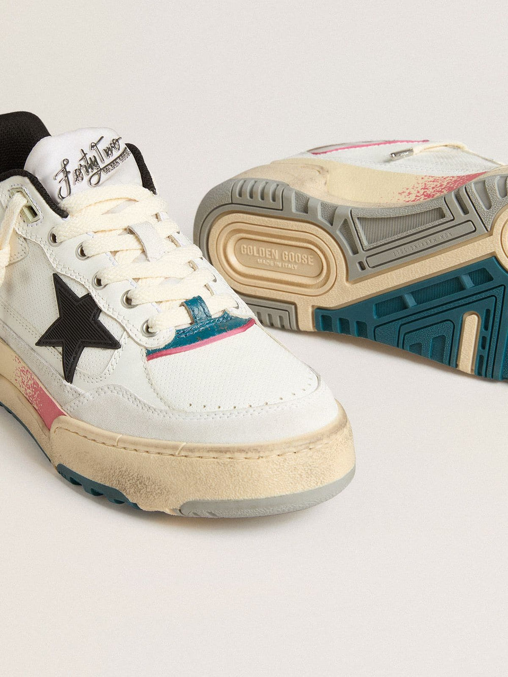 Men's Forty2 with black star and silver foiled leather heel tab