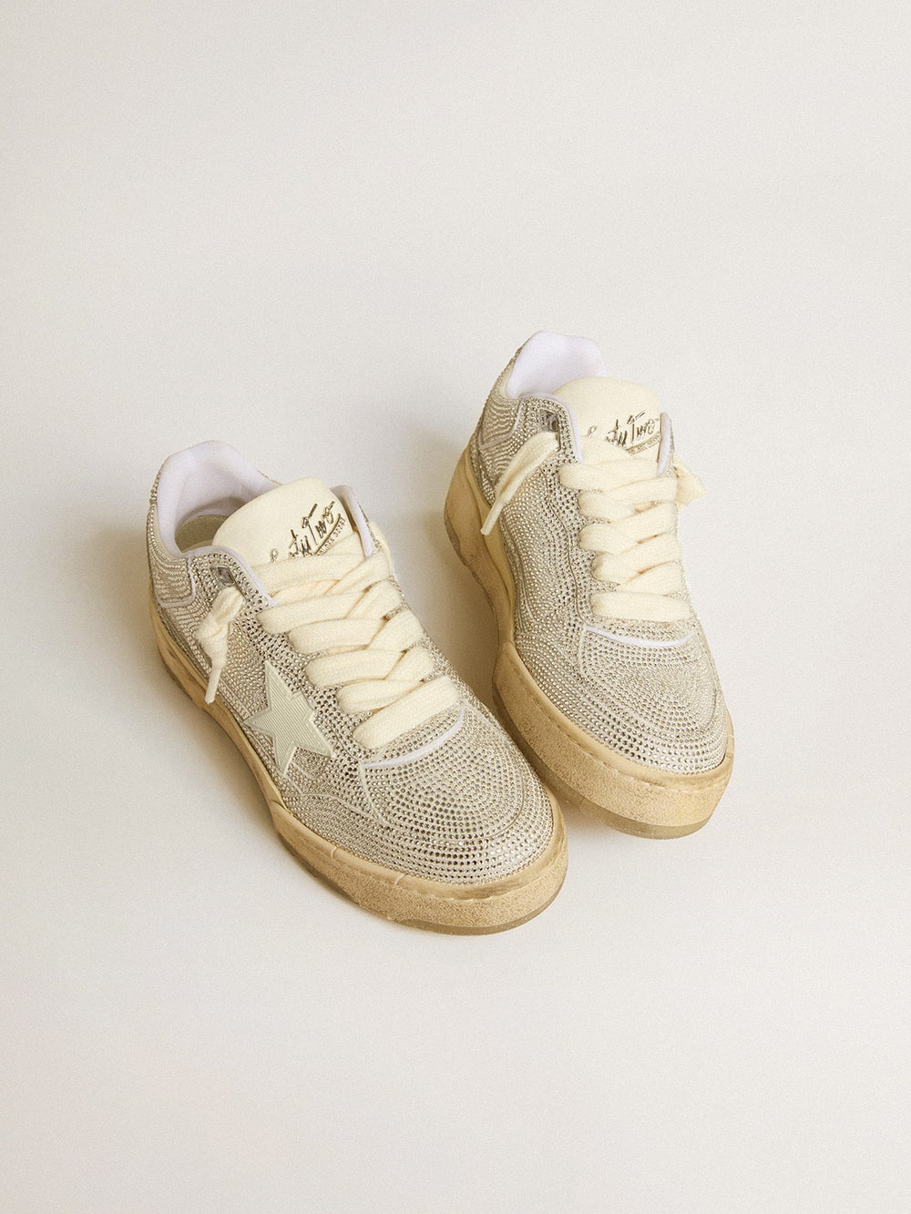 Forty2 in white leather and Swarovski crystals with white TPU star