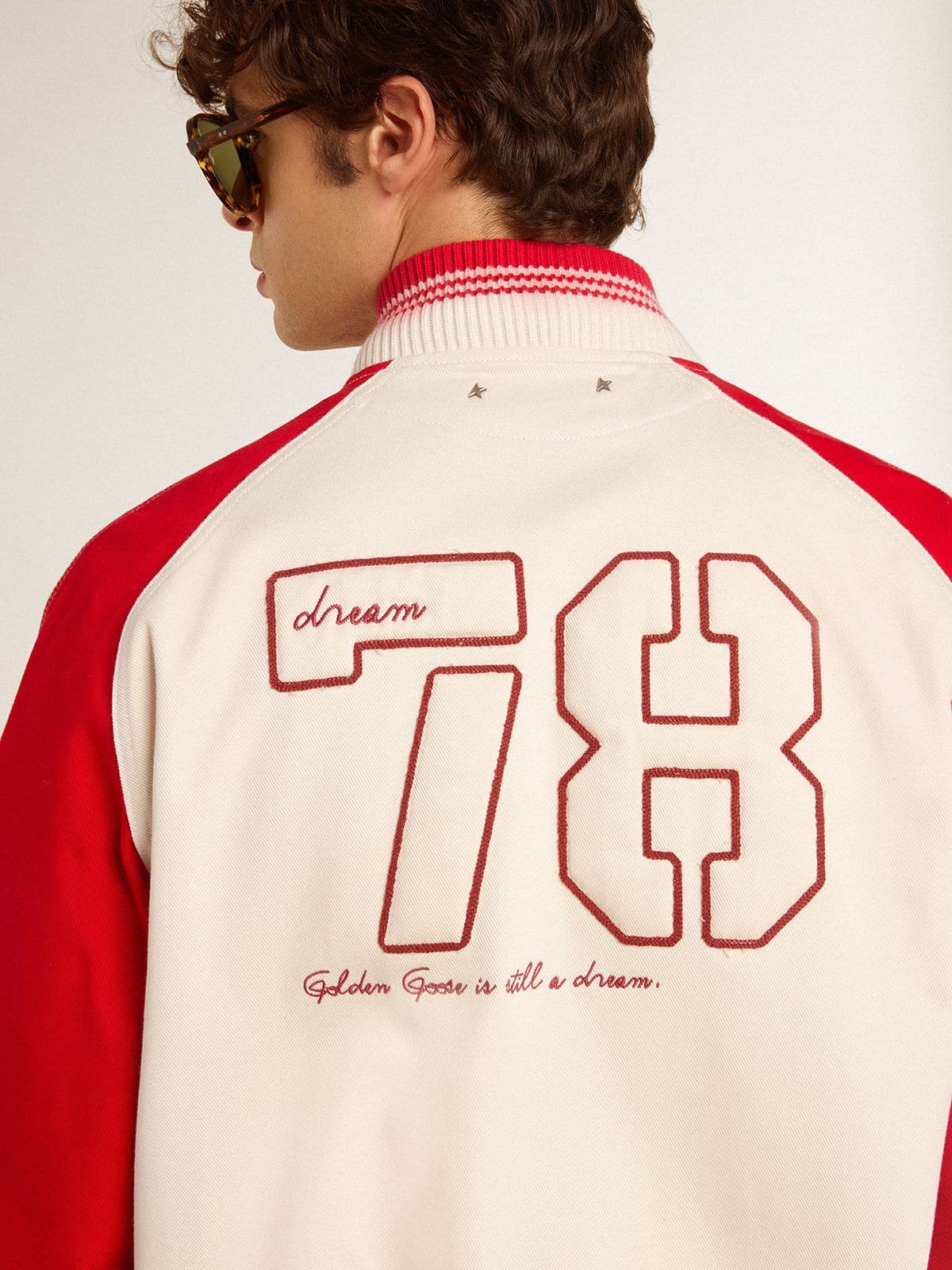 Bomber jacket in worn white and red with embroidery