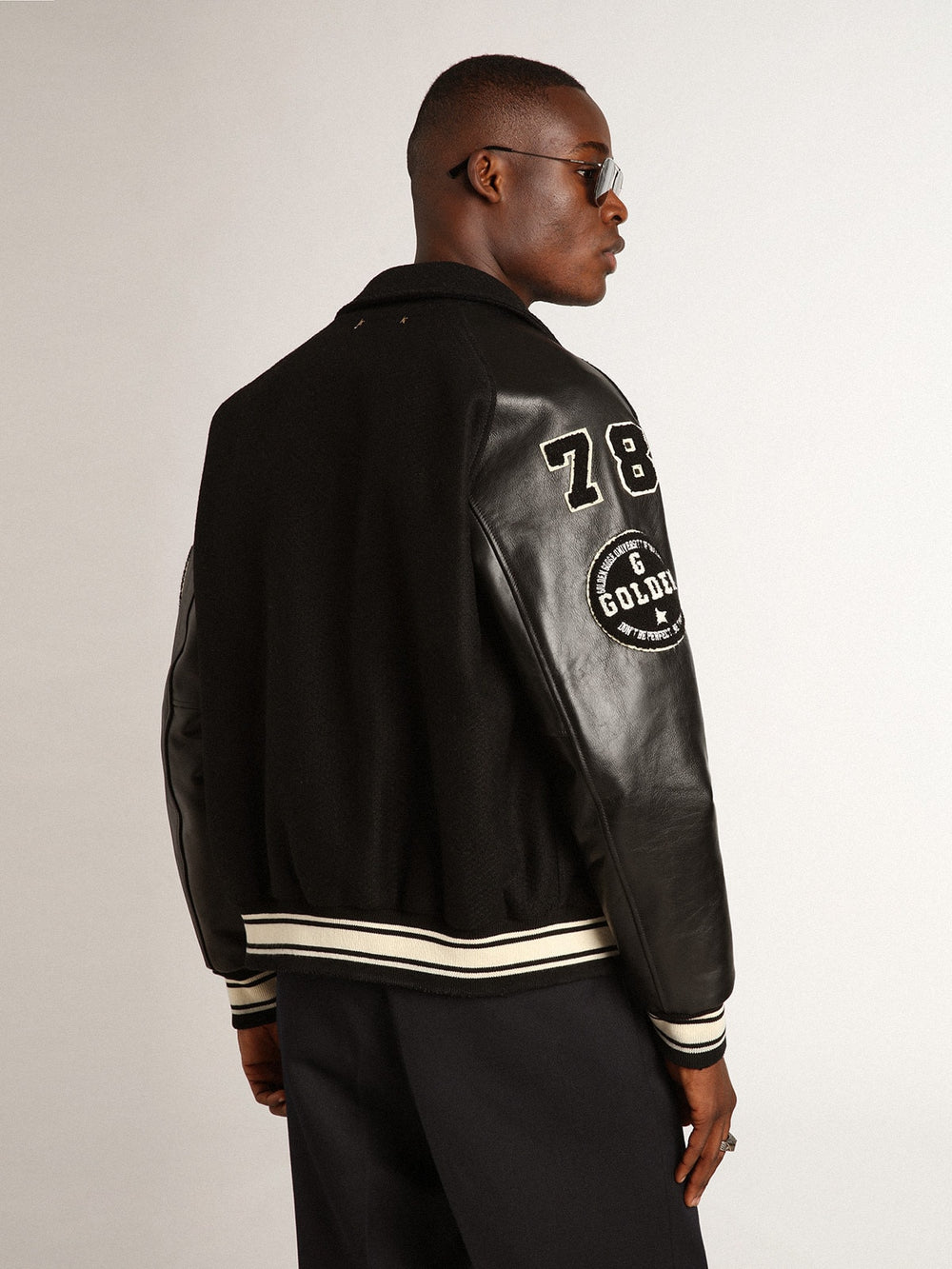 Black wool bomber jacket with patch