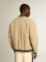 Khaki-colored quilted cotton bomber jacket