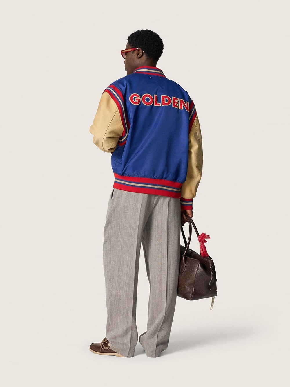 Men’s beige crew neck sweater with ‘Golden’ lettering on the back