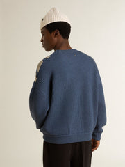 Men's light blue jacquard wool sweater with cream-colored pattern